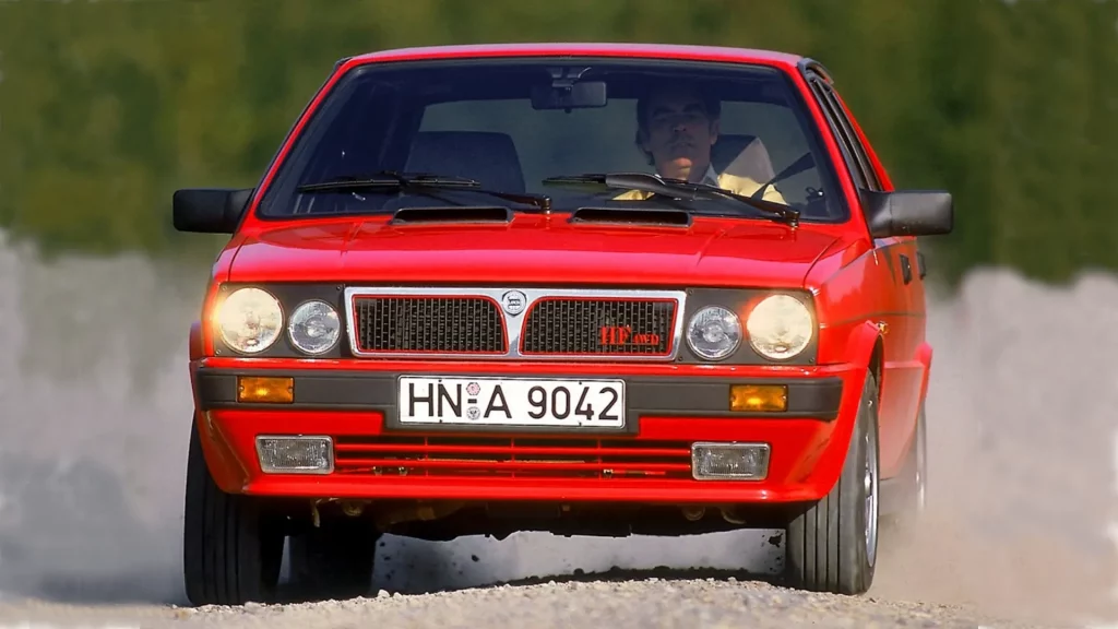 lancia delta hf 4wd, lancia delta 4wd, delta hf 4wd, lancia delta hf, lancia delta deportivo, lancia hf, lancia delta 4x4, lancia delta turbo, lancia delta 1986 hf 4wd, lancia delta hf 4wd historia, lancia delta hf 4wd características, lancia delta hf 4wd ficha técnica, lancia delta hf 4wd prestaciones, lancia delta hf 4wd curiosidades, lancia delta hf 4wd sonido motor, lancia delta hf 4wd interior, lancia delta hf 4wd exterior, lancia delta hf 4wd coleccionistas, lancia delta hf 4wd clásico moderno, lancia delta hf 4wd mantenimiento, lancia delta hf 4wd fiabilidad, historia del lancia delta hf 4wd, evolución del lancia delta hf 4wd, diferencias entre delta hf 4wd e integrale, lancia delta hf 4wd frente al sierra cosworth, lancia delta hf 4wd vs audi quattro, por qué el lancia delta hf 4wd es un coche de culto, curiosidades del lancia delta hf 4wd, coches italianos deportivos, coches de los 80, grupo a, rally grupo b época transición, lancia competición, lancia martini racing, coches de rally легенdarios, 4x4 deportivo clásico, hatchback deportivo, coches icónicos de lancia, coches de culto, coches con alma