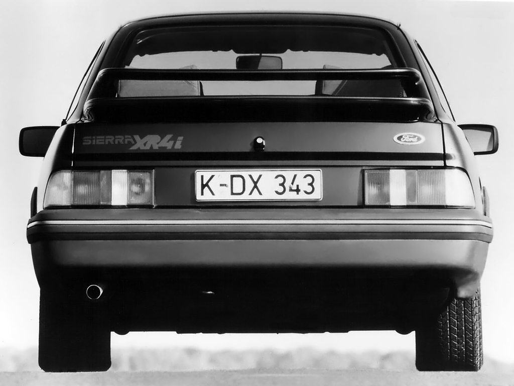 ford sierra xr4i, sierra xr4i v6, ford sierra xr4i, ford sierra deportivo, ford sierra xr4i 2.8 v6, ford sierra xr4i 1983, ford sierra coupé xr4i, ford sierra tracción trasera, ford sierra xr4i historia, ford sierra xr4i características, ford sierra xr4i ficha técnica, ford sierra xr4i prestaciones, ford sierra xr4i curiosidades, ford sierra xr4i sonido motor, ford sierra xr4i interior, ford sierra xr4i exterior, ford sierra xr4i restauración, ford sierra xr4i mantenimiento, ford sierra xr4i fiabilidad, ford sierra xr4i coleccionistas, ford sierra xr4i clásico moderno, historia del ford sierra xr4i, evolución del ford sierra deportivo, diferencias entre sierra xr4i y xr4x4, ford sierra xr4i frente al opel manta gsi, por qué el ford sierra xr4i es un coche de culto, curiosidades del ford sierra xr4i, coches deportivos de los 80, coupés deportivos clásicos, coches icónicos de ford, ford motorsport, coches de culto, coches con alma, v6 clásico, tracción trasera clásica