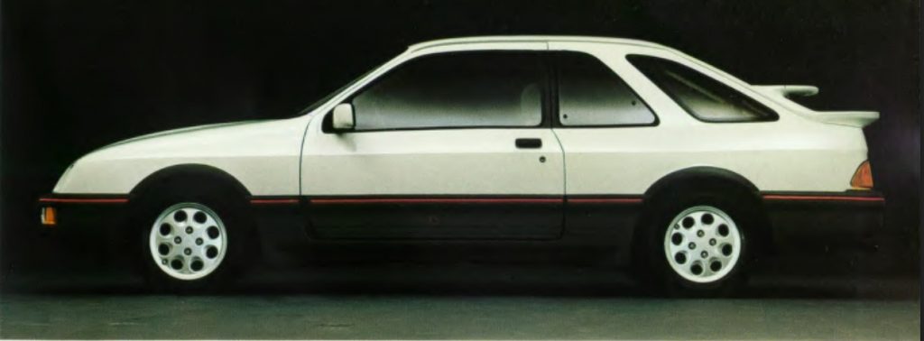 ford sierra xr4i, sierra xr4i v6, ford sierra xr4i, ford sierra deportivo, ford sierra xr4i 2.8 v6, ford sierra xr4i 1983, ford sierra coupé xr4i, ford sierra tracción trasera, ford sierra xr4i historia, ford sierra xr4i características, ford sierra xr4i ficha técnica, ford sierra xr4i prestaciones, ford sierra xr4i curiosidades, ford sierra xr4i sonido motor, ford sierra xr4i interior, ford sierra xr4i exterior, ford sierra xr4i restauración, ford sierra xr4i mantenimiento, ford sierra xr4i fiabilidad, ford sierra xr4i coleccionistas, ford sierra xr4i clásico moderno, historia del ford sierra xr4i, evolución del ford sierra deportivo, diferencias entre sierra xr4i y xr4x4, ford sierra xr4i frente al opel manta gsi, por qué el ford sierra xr4i es un coche de culto, curiosidades del ford sierra xr4i, coches deportivos de los 80, coupés deportivos clásicos, coches icónicos de ford, ford motorsport, coches de culto, coches con alma, v6 clásico, tracción trasera clásica