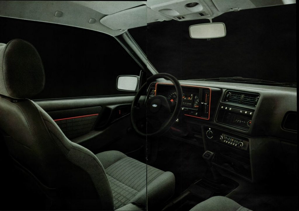 ford sierra xr4i, sierra xr4i v6, ford sierra xr4i, ford sierra deportivo, ford sierra xr4i 2.8 v6, ford sierra xr4i 1983, ford sierra coupé xr4i, ford sierra tracción trasera, ford sierra xr4i historia, ford sierra xr4i características, ford sierra xr4i ficha técnica, ford sierra xr4i prestaciones, ford sierra xr4i curiosidades, ford sierra xr4i sonido motor, ford sierra xr4i interior, ford sierra xr4i exterior, ford sierra xr4i restauración, ford sierra xr4i mantenimiento, ford sierra xr4i fiabilidad, ford sierra xr4i coleccionistas, ford sierra xr4i clásico moderno, historia del ford sierra xr4i, evolución del ford sierra deportivo, diferencias entre sierra xr4i y xr4x4, ford sierra xr4i frente al opel manta gsi, por qué el ford sierra xr4i es un coche de culto, curiosidades del ford sierra xr4i, coches deportivos de los 80, coupés deportivos clásicos, coches icónicos de ford, ford motorsport, coches de culto, coches con alma, v6 clásico, tracción trasera clásica